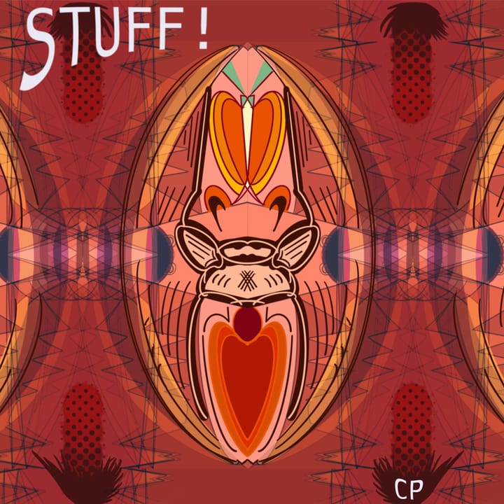 Absraction with focus on a figure that seems maybe a bit of a grotesque head… in reds and oranges